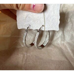 Silver Colored Oval Hoop Earrings with White Crystals